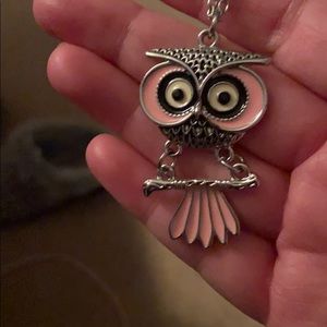 Silver and coral owl necklace.